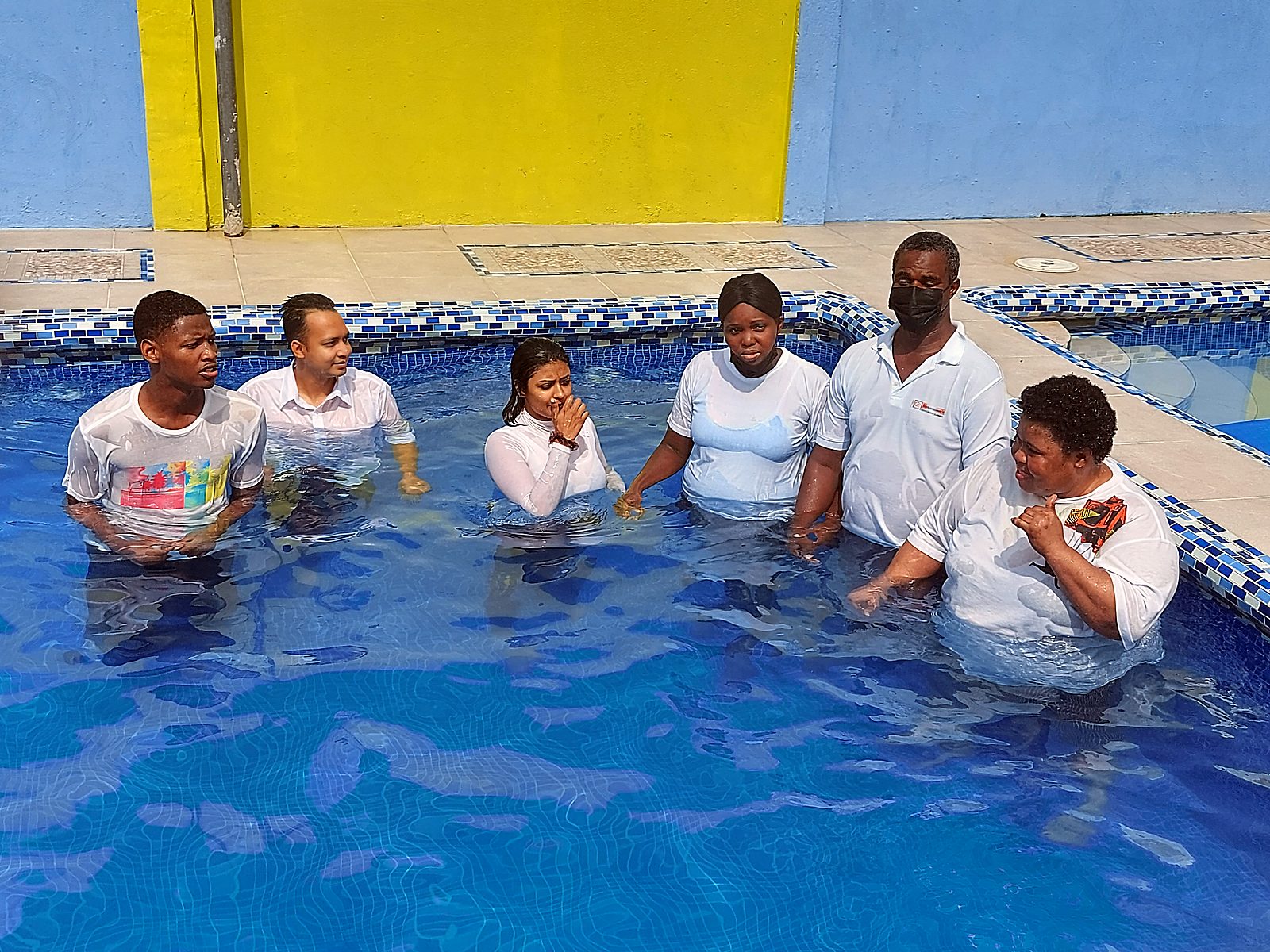 New believers at a baptism service